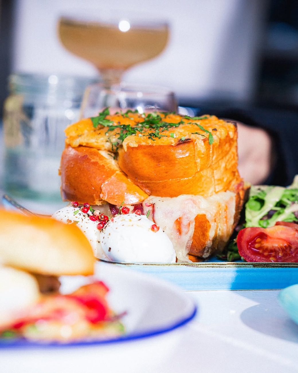 A tall stack of caramelised brioche French toast